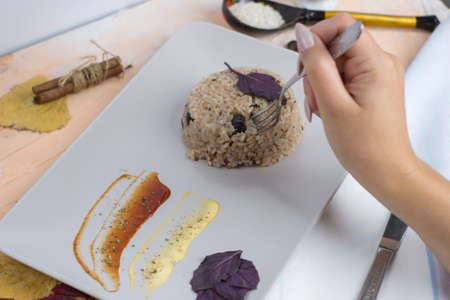 Congri dish of Cuban national cuisine. Congri, Rice with beans, a typical dish of Cuban food. Simple but delicious dish of rice with fried beans and Congri, typical Cuban dishの写真素材