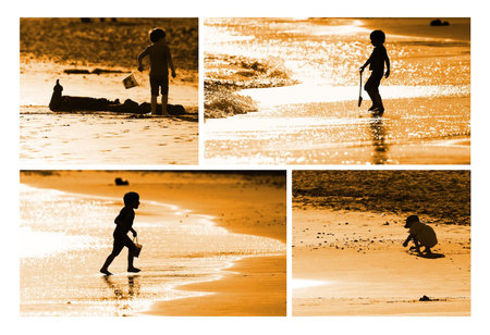 Child building sand castle on the seashoreの写真素材