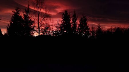  The view from the heights of a beautiful dramatic red sunset in the Khimni yearsの写真素材