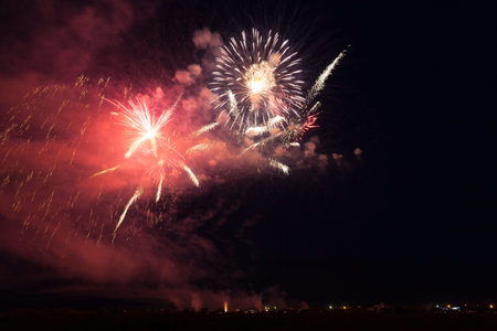 Colorful fireworks of various colors over night skyの写真素材