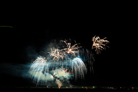 Colorful fireworks of various colors over night sky