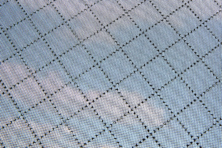 Mesh on the window, anti-dust. Modern Protection from smog, dust and allergens.