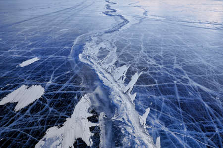 Texture of ice of Baikal lake in Siberia. blue lake ice.の写真素材