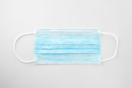 Medical mask, Medical protective mask on white background. Disposable surgical face mask cover the...