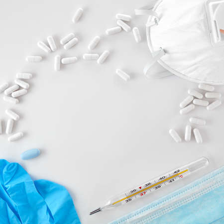 Highly effective respirator. Means of respiratory protection. Protective face mask means of protection against coronavirus infection, pneumonia, and respiratory diseases. medical respirator and pills.の写真素材