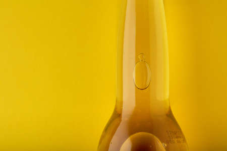 Bottle of Corona Extra Beer. On yellow background. Corona is made in Mexico and is the top selling imported beer in the United States. 03/13/2020, Russia.のeditorial素材