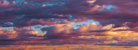 Beautiful Clouds at sunset, panorama of the sky. the colors of the sunset.
