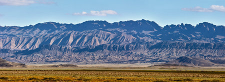 Pasture in the mountains of Mongolia. Landscapes of Mongolia, panorama of mountains in the Gobi...