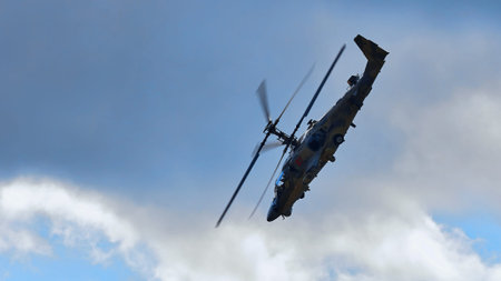 Kamov Ka-52 Alligator (NATO code name: Hokum B). Attack helicopter performing demonstration flight...