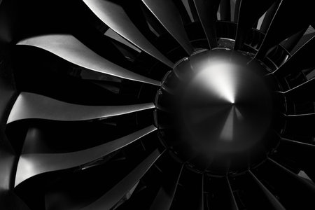 Modern turbofan engine. close up of turbojet of aircraft on black background. blades of the turbofan...