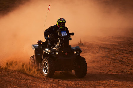 Quad Bike for Off Road Extreme Racing gets over the difficult part of the route during the Rally...