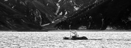 Swim in Packraft. Packraft, one-person light raft used for expedition or adventure racing, on a...