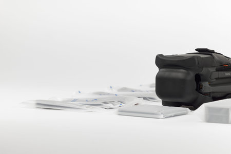 New DJI Mavic 3 drone on a white background when unpacking. Dajiang Innovations Technology Co., Ltd...