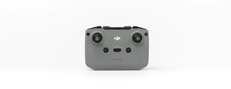 DJI remote control on white background. Control stick of the DJI Mavic 3 drone. Unpacking and...