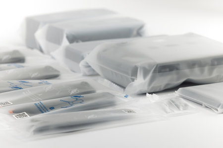 New DJI Mavic 3 drone on a white background when unpacking. Parts of the delivery set in the original packaging. DJI world leader developer and manufacturers in UAV. 17.12.2021, Rostov region, Russiaのeditorial素材