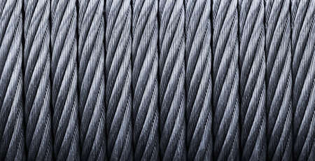 Metal cable winch. Steel rope winch close-up. Strong still backgroundの写真素材