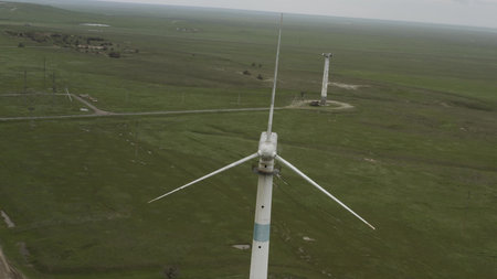 Aerial view of powerful Wind turbine farm for energy production. Wind power turbines generating...