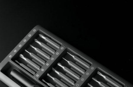 Screwdriver tips different shapes and sizes close up. Manual metal mini screwdriver and set of the interchangeable bits. Precision Screwdriver Kit. Steel Magnetic Bits. home appliance repair kitの写真素材