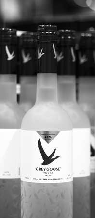 French vodka. Bottles of Grey Goose vodka fortress 43 degrees, on a shelf in duty free shop in Dubai Airport. Traditional souvenir. 12,02,2022, Dubai, UAEのeditorial素材