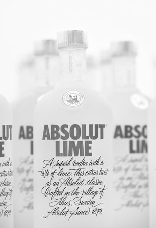 Bottles of Swedish vodka Absolut Lime. Bottles of Absolut Lime Vodka on a shelf of a duty free shop...