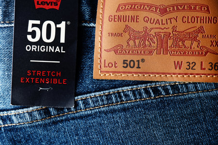 Levis logo and badges on Levi Strauss 501 jeans. New dark blue LEVIS 501 Jeans. Popular piece of clothing, classic jeans. Comfortable and practical jeans model. 31.12.2021, Rostov, Russiaのeditorial素材