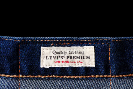 Close up of the details of new LEVIS 501 Jeans. label and patch LEVIS. Classic jeans model. LEVIS is...