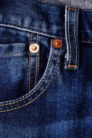 Close up of details of new LEVIS 501 Jeans. Buttons and seams and pockets close-up. Classic jeans model. LEVIS is a brand name of Levi Strauss and Co, founded in 1853. 31.12.2021, Rostov, Russiaのeditorial素材