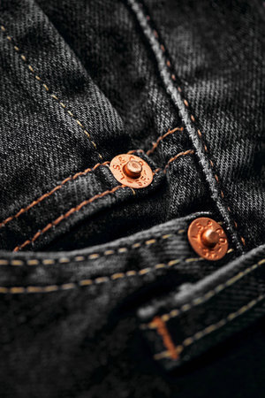 Close up of details of new LEVIS 501 Jeans. Buttons and seams and pockets close-up. Classic jeans model. LEVIS is a brand name of Levi Strauss and Co, founded in 1853. 31.12.2021, Rostov, Russiaのeditorial素材