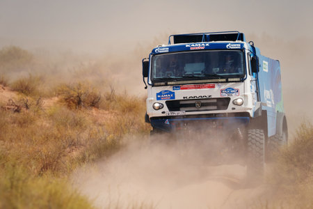 Extreme off-road racing. NEW Sports truck KAMAZ gets over the difficult part of the route during the Rally raid in sand. 14.07.2022 Kalmykia, Russiaのeditorial素材