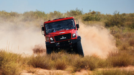 Extreme off-road racing. Sports truck MAZ Sport-auto team gets over the difficult part of the route during the Rally raid in sand. 14.07.2022 Kalmykia, Russiaのeditorial素材