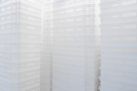 Plastic white boxes. Containers for transportation of food products.の写真素材