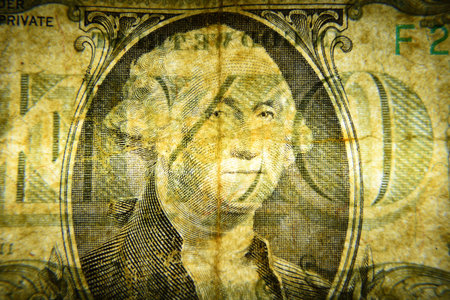 Dolar USA close-up. Old battered crumpled bills macro. The texture of the fragment of the dollar...