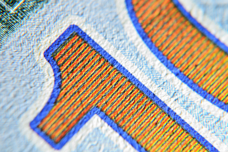 Dolar USA close up. Macro texture of a fragment of the dollar bill. USD banknote texture. One hundred American dollars macro.の写真素材