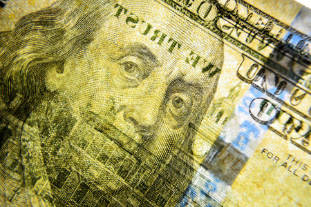 Dolar USA close up. Macro texture of a fragment of the dollar bill. USD banknote texture. One...