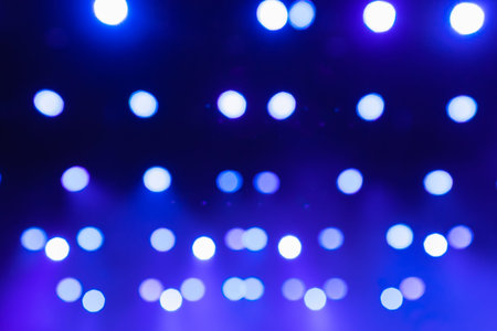 Light bokeh. Abstract blurred christmas background. Color circles in the lens blur zone.