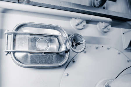 Sealed hatch. Close-up of an industrial machineの写真素材