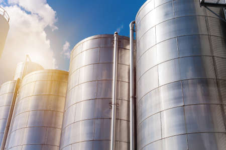 Rows of aluminum tanks against the sky. Modern elevator.の写真素材