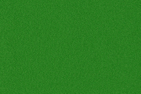This vibrant green grass surface offers an ideal setting for various outdoor activities, sports, and leisure. Its uniform texture and rich color create an inviting atmosphere.の写真素材