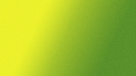 A smooth gradient background featuring a blend of bright yellow shifting into a vivid green, perfect for graphic design, web backgrounds, or artistic projects.の写真素材