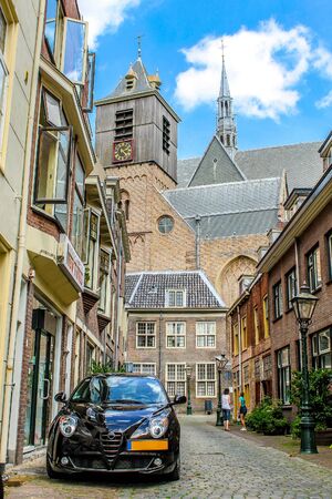 Car on the old street of Delftのeditorial素材