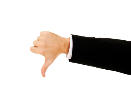 businessman's hand shows thumb down on a white background