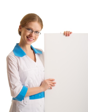 female doctor holding blank billboard isolatedの写真素材