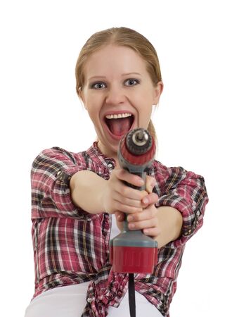 cheerful girl with cordless drill isolated の写真素材