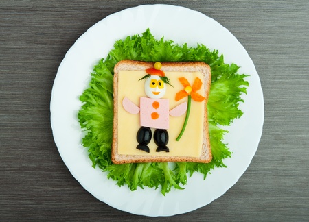 design food. Creative sandwich for a child with a picture little manの写真素材
