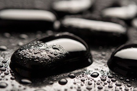 spa background. Black stones with water dropsの写真素材