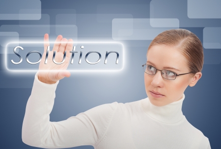 business concept. Young modern business woman chooses solution and successの写真素材