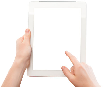 white tablet with a  blank screen in the hands of  woman isolated on white backgroundの写真素材