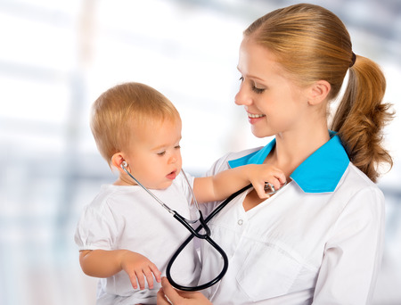 female doctor pediatrician and patient happy child babyの写真素材