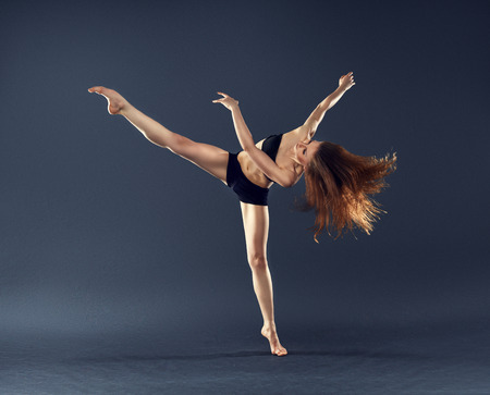 beautiful dancer with flowing hair dancing dance ballet contemporary styleの写真素材