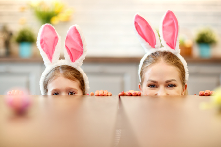Happy easter! funny happy family mother and daughter with hare ears
の写真素材